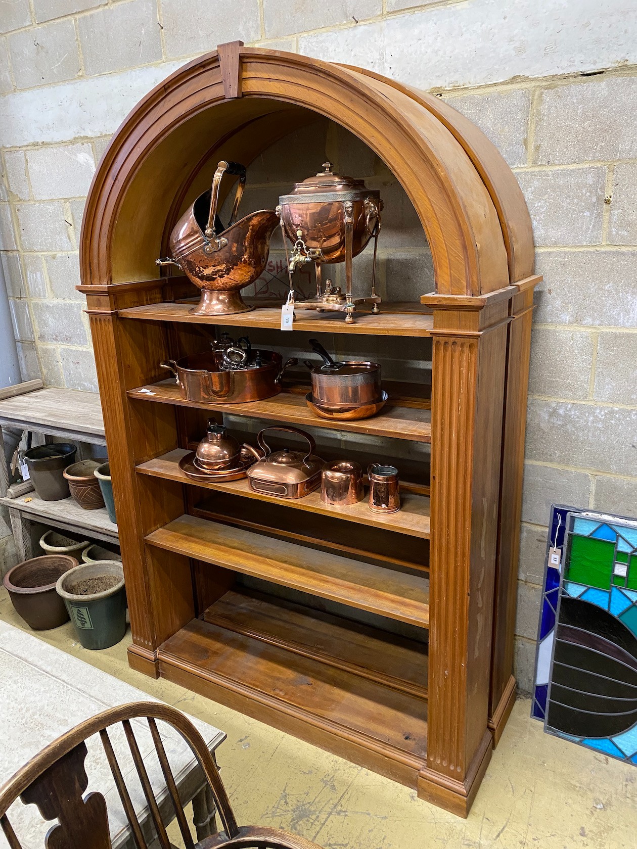 A pair of George III style pine dome topped open bookshelves, width 142cm, depth 26cm, height 216cm